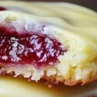 Raspberry Thumbprint Cookies with Lemon Glaze Recipe Christmas Bundt Cake Recipes, Cranberry Desserts, Raspberry Thumbprint, Lemon Glaze Recipe, Christmas Bundt Cake, Cookies With Lemon, Raspberry Thumbprint Cookies, Christmas Cranberry, Cookies Lemon