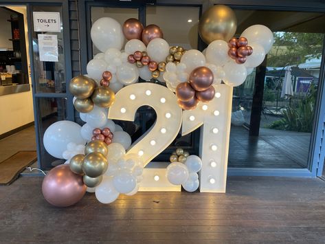 Light up 21 with a balloon garland by Balloons By Bridget. 21 Balloon Arch, 18th Balloon Garland, Balloon Decorations 21st Birthday, 21st Birthday Ideas Balloons, 21 Balloon Garland, 21st Balloon Garland, 21st Balloons, 21st Birthday Color Schemes, Balloon Arch With Numbers