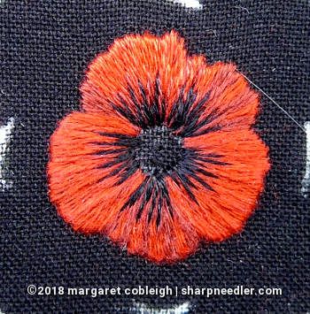 Embroidered remembrance poppy with black accents on petals (DMC version) Poppy Embroidery Design, Poppy Hand Embroidery, Embroidery Poppy Pattern, How To Embroider A Poppy Flower, Embroidered Poppy Flower, Black Flower Embroidery, Embroidery Poppy Flower, Poppy Cross Stitch Pattern, Poppy Embroidery Pattern