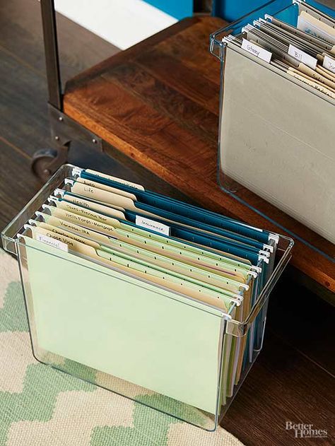 Do set up file boxes to organize papers you use monthly. Store the file boxes on a shallow table or bookcase to keep your desktop clutter free. Use four different colors of hanging file folders to help you easily distinguish between financial, insurance, personal, and household documents. Hanging File Organizer, Essential Office Supplies, Craft Paper Storage, File Folder Organization, Office Organisation, Office Organization At Work, Folder Organization, Hanging File Folders, Paper Clutter