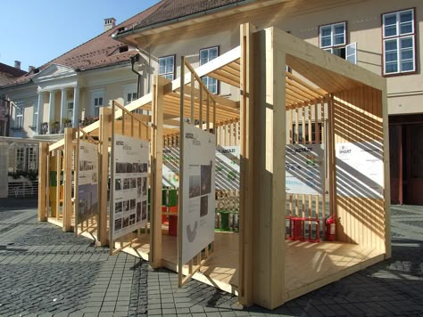 Image 1 of 21 of Urban TelesCOOP/Temporary Pavilion | COOP pe Strada | Temporary Building, Temporary Pavilion, Folding Architecture, Temporary Structures, Pavilion Design, Creative Architecture, Stall Designs, Cube Design, Community Garden