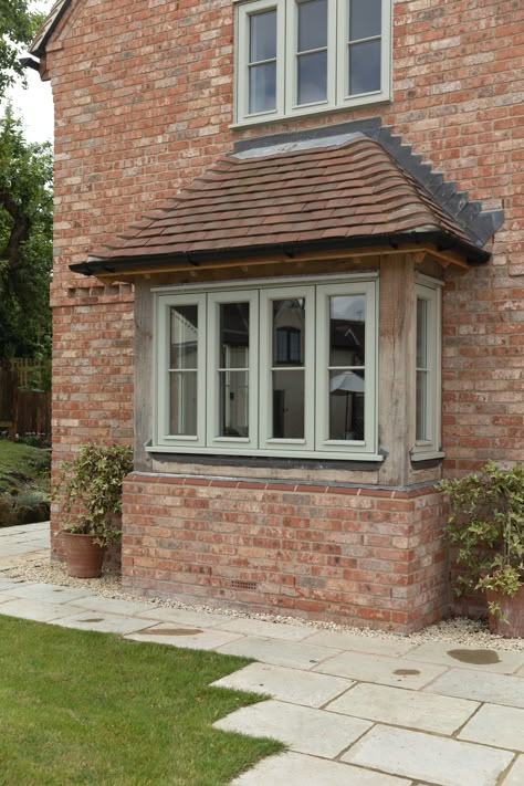 Bungalow Brick Exterior, English Cottage Extension, Cottage Bay Window Exterior, Cottage House Porch, Country Cottage Windows, Rendered Cottage Exterior, New Build Window Ideas, Cream Window Frames, Bungalow Windows Exterior