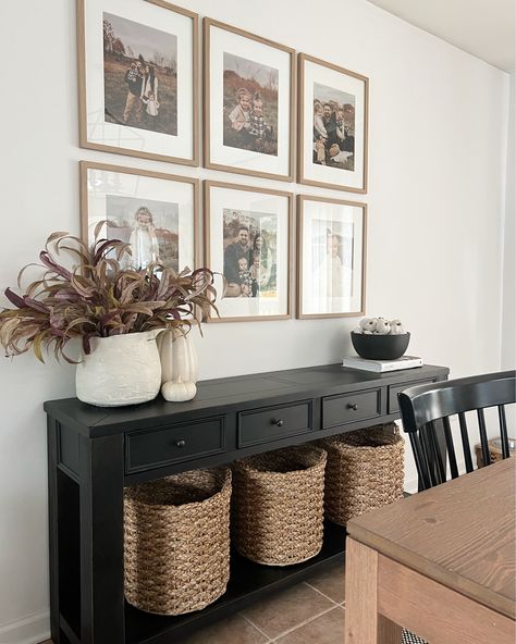 Baskets Under Buffet Table, Photos Above Buffet Table, Buffet Table Wall Decor, Photos Above Sideboard, Above Table Wall Decor, Buffet Top Decor Ideas, Dining Buffet Table Decor, Styling A Buffet In Living Room, Black Buffet Table Decor