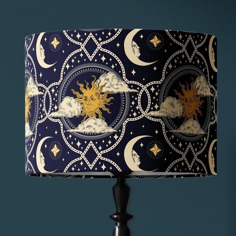 Diameter: 30cm Height: 21cm Type: Table Lamp Shade Bulbs: B22, E14, E27, E26 - adaptor included Made to order, please allow up to two weeks for delivery. Print placement and colours may vary slightly from the sample image.  Fascinated by the night sky and want a little magic in your home? Say no more! This scrumptious Velvet Day and Night Lampshade with intricate sun and moon motives is guaranteed to turn heads. The medallions are inspired by illuminated manuscripts and carry a distinct engravin Constellation Lamp Shade, Whimsigoth Library, Whimsigoth Lamp, Witchy Lamp, Witchy Apartment Decor, Witchy Apartment Aesthetic, Witchy Furniture, Celestial Room Aesthetic, Astrology Decor