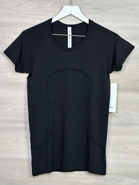 Lululemon Swiftly Tech Short Sleeve 2.0 Size 8 Black 50155 071823CR1 Condition is New With Tags. Shipped with USPS. Will combine shipping on multiple purchases and refund any shipping overage on orders shipped within the US (Combined shipping not available for separate Ebay International Shipping Orders please contact me for a bundle listing) . Swifty Tech Long Sleeve Lululemon, Black Lulu Swiftly Tech, Lululemon Swiftly Tech Short Sleeve Black, Lululemon Black Swiftly Tech, Black Lululemon Shirt, Lululemon Tops Shirts, Black Swiftly Tech Outfit, Lululemon T Shirt, Casual Black Lululemon Activewear