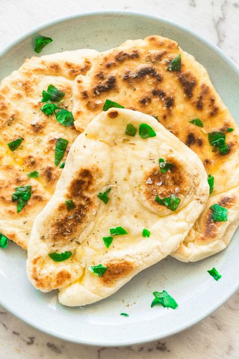 2 Ingredient Dough Naan Bread Recipe made with no yeast and no dairy- Weight watchers 2 ingredient Greek yogurt dough. An easy 10-minute recipe to yield thick, fluffy and doughy naan breads. Easily made vegan, gluten free and low calorie. Oat Flour Naan Bread, Naan Bread Vegan, Yogurt Dough, Magic Dough, Easy Naan, Blended Oats, Pane Naan, Gluten Free Naan, Vegan Greek Yogurt