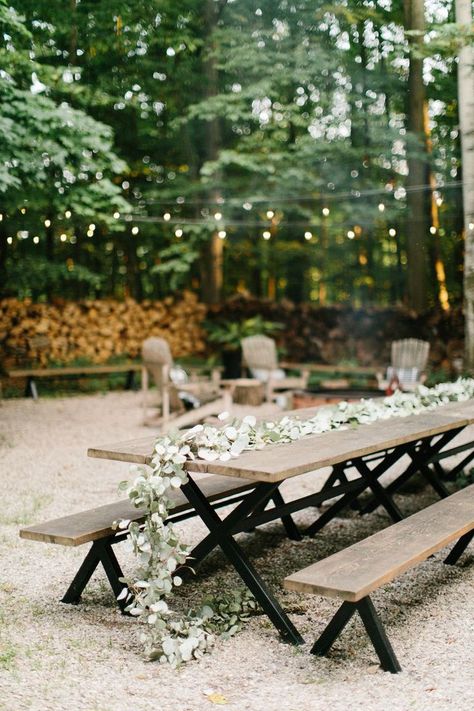 Picnic tables draped with floral garlands and twinkle lights are perfect for an outdoor wedding reception.  #love #inspiration #diy #wedding #decorgoals #ideas Picnic Table Wedding, Outdoor Wedding Cake, Outdoor Wedding Ideas, Diy Outdoor Weddings, Wedding Lounge, Garden Venue, Outdoor Trees, Picnic Tables, Ceremony Seating