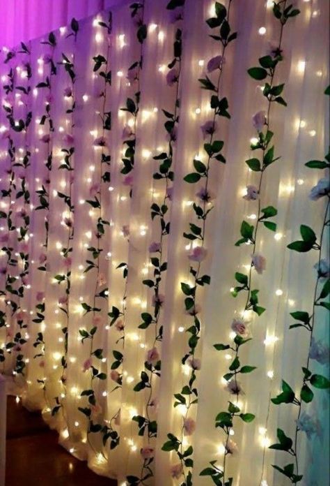 Flower Vines Backdrop, Vines With Flowers Room Decor, Curtain Lights With Flowers, Flowers And Lights Decor, Diy Quinceanera Backdrop, Flowers Hanging From Ceiling Bedroom Diy, Flower Back Drops For Parties, Ethereal Party Decor, Aesthetic Ganpati Decoration