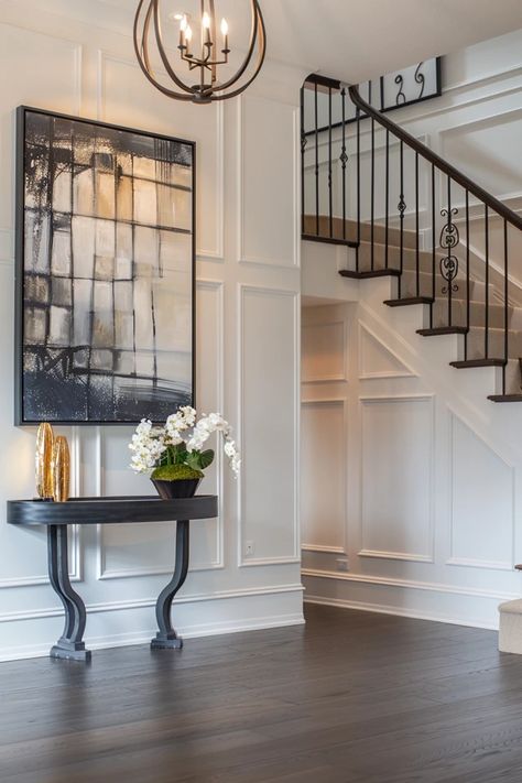 Elevate Your Entryway with Two Story Foyer Wall Decor Ideas Foyer Into Dining Room Entryway, Large Wall Entryway Ideas, High Ceiling Foyer Ideas Entryway, Foyers Ideas Entryway, Tall Entryway Ideas, Tall Entryway Ideas High Ceilings, Two Story Foyer Ideas, Two Story Foyer Ideas Entryway, Stair Paint