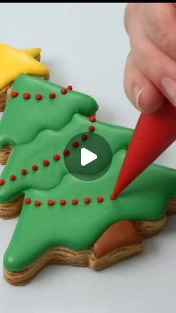 Stephanie | Little Cookie Co on Instagram: "I love the shape of this Christmas tree! So many ways to decorate it 🎄  #christmasbakingideas #christmastree #cookietutorials #Christmascookies #decoratedsugarcookies #decoratedcookies #royalicing #cookietutorials #howtobakesugarcookies #howtodecoratecookies #littlecookieco" How To Decorate Christmas Cookies With Royal Icing, Royal Icing Christmas Tree Cookies, Reindeer Sugar Cookies Decorated, Christmas Tree Royal Icing Cookies, Christmas Tree Cookies Royal Icing, Pumpkin Sugar Cookies Decorated, Little Cookie Co, Christmas Tree Sugar Cookies, Christmas Cookie Icing