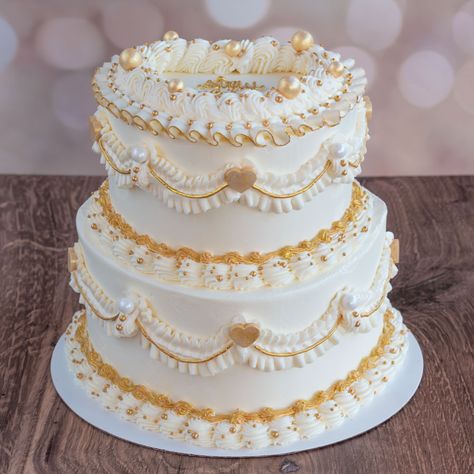 Celebrate your once-in-a-lifetime golden gluten-free birthday with this 2-tier gold & white Victorian heart cake. "Stay Golden" my friends. White And Gold Cake 2 Tier, 2 Tier Gold Cake, White And Gold Vintage Cake, Gold And White Cakes, 2 Tier Heart Cake, Gold Two Tier Cake, White And Golden Cake, Golden Cake Design, 2 Tier Vintage Cake