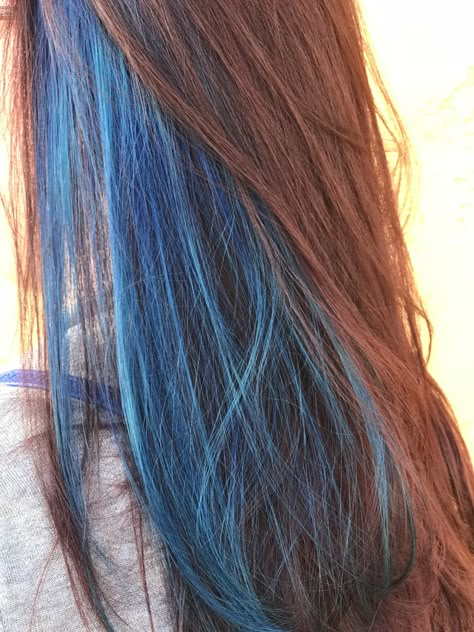 Red hair with a pop of blue Ginger Hair With Blue Underneath, Copper Hair With Blue Highlights, Red And Blue Streaks In Hair, Ginger Blue Hair, Red Hair With Blue Underneath, Ginger Hair With Blue Streaks, Auburn Hair With Blue Highlights, Blue Highlights In Red Hair, Red Hair Blue Highlights