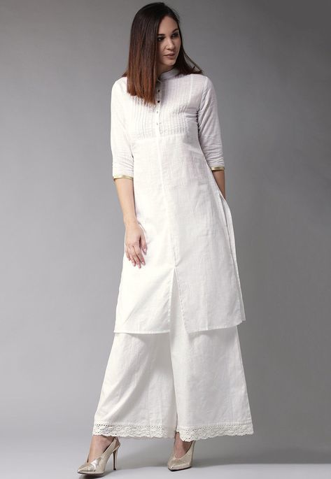 Cotton Slub Straight Kurta in White This Readymade Attire is Highlighted with Crochet Lace. Crafted in Mandarin Collar and Quarter Sleeves Its Length is 45 inches Do note: Bottom and Accessories shown in the image are for presentation purpose only and length may vary upto 2 inches.(Slight variation in actual color vs. image is possible). Indian Tunics For Women, Western Party Wear Dresses, Kurti With Palazzo, Indian Tunic, White Kurta, Cotton Kurti Designs, A Line Kurta, Utsav Fashion, Casual Tunics