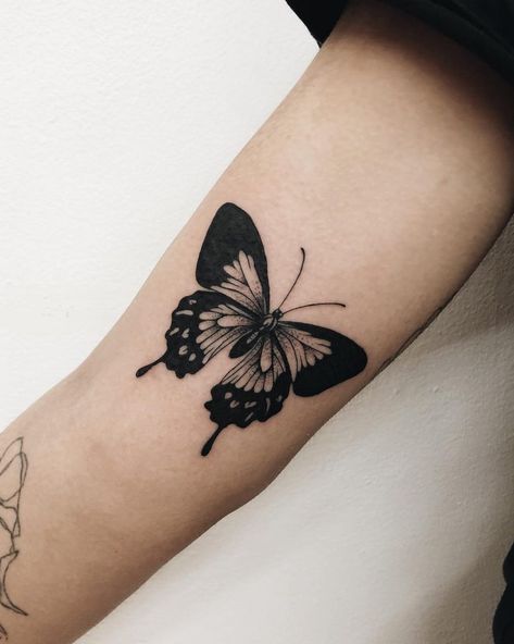 Black butterfly tattoo on the right arm by Finley Jordan Tattoo Papillon, Jordan Tattoo, Black Butterfly Tattoo, Canvas Tattoo, Initial Tattoo, Butterfly Tattoo Designs, Butterfly Tattoos, Waves Tattoo, Dream Tattoos