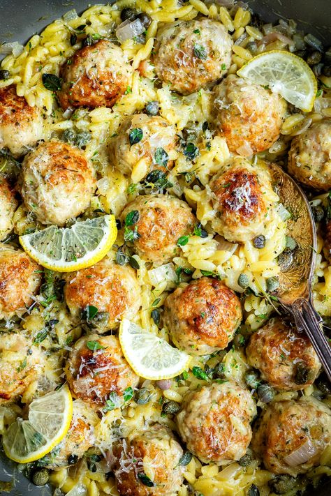 Chicken Piccata Meatballs with orzo – this delicious chicken meatball recipe will tantalize your taste buds with its zesty lemon caper sauce!! Chicken Meatball Sauce, Chicken Meatballs With Orzo, Chicken Piccata Meatballs, Chicken Meatball Recipe, Baked Chicken Meatballs, Lemon Caper Sauce, Chicken Piccata Recipe, Chicken Meatball, Meatball Dinner