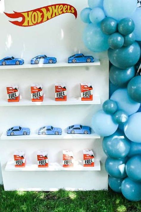 Check out this cool Hot Wheels-themed birthday party! The party favor stand is wonderful!! See more party ideas and share yours at CatchMyPary.com Party Favor Stand, Hot Wheels Centerpieces Ideas, Hot Wheels Favors, Hot Wheels Party Favors, Hot Wheels Birthday Party Ideas, Hot Wheels Birthday Party, Hot Wheels Themed Birthday Party, Hotwheels Birthday Party, Girl Birthday Party Favors