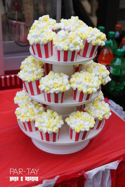 Circus birthday party feature Drive In Movie Party, Popcorn Cupcakes, Circus Birthday Party Theme, Party Popcorn, Carnival Birthday Party Theme, Movie Night Birthday Party, Movie Birthday Party, Movie Themed Party, Circus Theme Party