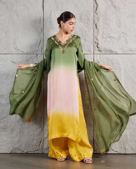 Look 7💚💛 . Embrace timeless elegance with our green ocher ombre organza long kurta, featuring delicate hand embroidery on the V-neck and sleeves. Paired with ocher straight palazzos and a matching organza dupatta, this ensemble is perfect for any occasion. . AAINA Festive 24 ✨ . . Creative Direction & Production: @saniyasugla Photography: @metro_studio_delhi_ Talent: @avnimaini @supreet18 HMUA: @makeupbygunikatalwar2.0 @shaluhairstylist12 Videography: @saniyasugla & team ( Tunika & Eshika ) Semi-stitched Floor-length Organza Kurta, Ombre Kurta Women, Long Sleeve Semi-stitched Organza Kurta, Semi-stitched Green Organza Kurta, Semi-stitched Yellow Organza Dupatta, Satin Hands, Beaded Neckline, Green Ombre, Organza Dupatta