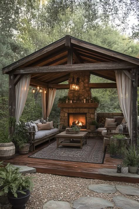 29 Rustic Living Room Ideas to Create a Cozy Gathering Space Amazing Outdoor Living Spaces, Outdoor Fireplace And Pergola, Backyard Pavilion With Fireplace, Rustic Outdoor Patio Ideas, Gazebo Fireplace, Outdoor Pavillion Ideas, Rustic Backyard Ideas, Outdoor Living Space Diy, Fireplace Ideas Outdoor