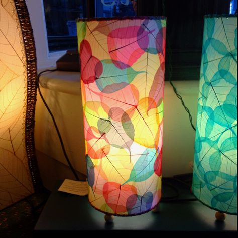 Lamp covered in butterfly leaves Leaf Lampshade Diy, Vine Table Lamp, 3d Led Lamp Leaf, Leaf Lamp, Lamp Making, Skeleton Leaves, Tiffany Butterfly Lamp, Tissue Paper Art, Diy Glass Bottle Crafts