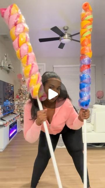 Waverly on Instagram: "Another #throwback of My giant #rainbow twist #lollipop #diy I did  last year for my #candylandchristmas ! #giantlollipop #giantcandy  #dollartreediy #candyland #giantprop #rainbowlollipop #artsandcrafts" How To Make Giant Lollipops, Candyland Charcuterie Board, Diy Candy Kebobs, Diy Candyland Outdoor Decorations, Diy Yard Lollipops, Oversized Candy Props, Diy Christmas Decorations Candyland, Christmas Diy Candy Decorations, Christmas Float Decorations