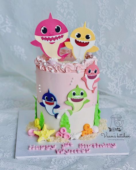 Baby Shark Cake for a little girl turning 1st #birthdaycakes #cupcakes #buttercreamcakes #fondantcakes #customcakes #handmadetopper #cakedecor #cakedesign #sydneycake #sydneycakes #vaanskitchen #spongecake #babysharkcake #babysharkcakes Baby Shark Birthday Party Girl Cake, Baby Shark Cake Girl, Birthday Cake For Girls Kids, Baby Shark Birthday Party Girl, Fondant Cake Tutorial, Baby Shark Cake, Shark Themed Birthday, Doll Birthday Cake, Shark Themed Birthday Party