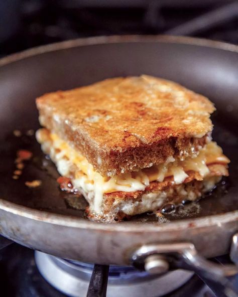 Because basic grilled cheese with its ooey gooey insides just didn't seem indulgent enough, we coated the outside with Parmesan that crisps to a crisp, crunchy golden brown. You may never go back to the classic grilled cheese. #cheese #grilledcheese #sandwich #kidfriendly #comfortfood Basic Grilled Cheese, Grilled Mac And Cheese, Grilled Cheese Croutons, Grill Cheese, Cheese Croutons, Grilled Sandwiches, Grill Cheese Sandwich Recipes, Classic Grilled Cheese, Recipes Cheese