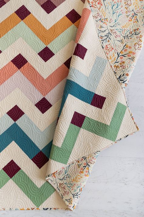 Ready to Elevate Your Quilting Game? Explore this stunning beginner-friendly Thrive Quilt by Suzy Quilts, showcasing fabrics from Signature PURE Solids. With various sizes available, it's the perfect way to level up your quilting skills. Find this quilt pattern and more sewing inspiration in our Lookbook! Let's start stitching. #ArtGalleryFabrics #QuiltsAesthetic QuiltBlocksEasy #CozyQuilts #QuiltDesigns #ModernQuilting #PatchworkQuilting #SewingInspiration #PatchworkQuilts Simple Quilt Patterns, Solid Color Quilts, Suzy Quilts, Patchwork Inspiration, Solid Quilt, Diy Fabric Crafts, Signature Quilts, Cozy Quilts, Beginner Quilt Patterns