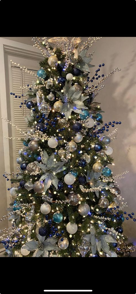 Icy Christmas Tree Decorating Ideas, Corporate Christmas Tree Ideas, Jack Frost Christmas Tree, Blue And Green Christmas Tree Ideas, Frozen Christmas Tree Ideas, Black And Blue Christmas Tree, Teal And Silver Christmas Tree, Blue And Silver Christmas Tree Ideas, Christmas Tree Decor Ideas Diy