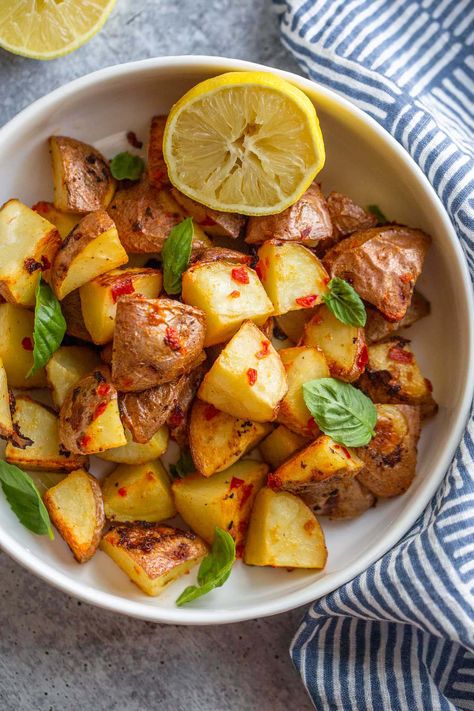 Calabrian potatoes are an easy and delicious dish made with Calabrian chili paste, olive oil, and spices. This is a slightly spicy dish that is perfect paired with your favorite chicken or fish. Chili Potatoes, Calabrian Chili Paste, Calabrian Chili, Spicy Dishes, Chili Paste, Favorite Chicken, Tasty Dishes, Italian Recipes, Olive Oil