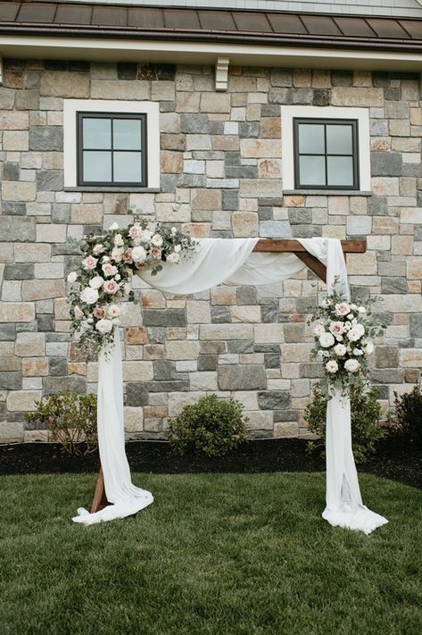 Backyard-classic-romantic-wedding Wedding Arch Drapery And Flowers, How To Make Arbor Flowers, Wedding Arbor Drapery, Wooden Arbor Wedding Flowers, Classic Wedding Arbor, Wood Ceremony Arch, Wooden Arbour Wedding, Arch Floral Decor, Wedding Arch Roses