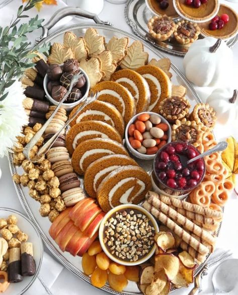 Get ready for a taste of fall with these Thanksgiving dessert board ideas! Mini pies, pumpkin-shaped chocolates, maple cookies, and charming turkeys in autumnal colors create a delightful spread. Feast your eyes on Heather Baird's sweet board from Sprinkle Bakes, radiating serious autumn vibes. And yes, we're definitely claiming all the Pumpkin Spice cake – thank you very much! Traditional Holiday Desserts, Thanksgiving Charcuterie Board, Thanksgiving Hacks, Thanksgiving Charcuterie, Dessert Charcuterie Board, Party Boards, Dessert Charcuterie, Thanksgiving 2023, Thanksgiving Snacks