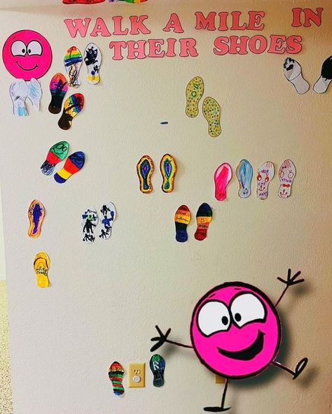 Miss Haylee on Instagram: "“Walk a Mile in Their Shoes” - A little spot of Empathy activity! I had the kiddos decorate the “shoes” with things that represent them and their likes! All is made of construction paper. Tags ——— #socioemotionallearning #alittlespotofemotions #therock #childrensbooks #childrentherapy #childrentherapy #schoolcounselor #counseling #sel ##dianealberbooks #mentalhealth #specialeducation #mentalhealthawareness #mentalhealthmatters" Empathy Activities, Walk A Mile, Construction Paper, School Counselor, Mental Health Matters, Paper Tags, Mental Health Awareness, Children’s Books, Special Education