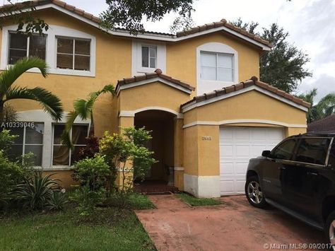 9641 Sw 163rd Ave, Miami, FL 33196 - realtor.com® Florida Townhouse, Miami Homes, Houses Styles, Miami Beach House, House In Miami, House For Sell, Fake Home, Sims 4 Save File, Small House Exterior