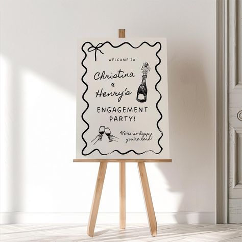 Welcome your guests with style using our Hand-Drawn Engagement Party Welcome Sign Canva Template! This elegant design features a whimsical wavy border, handwritten-style fonts, and charming hand-drawn elements, including a champagne bottle and "cheers" elements. Perfect for setting the tone of your celebration, this sign is fully customizable in Canva, allowing you to personalize it to match your event's theme. 𝗚𝗘𝗧 𝗧𝗛𝗘 𝗠𝗔𝗧𝗖𝗛𝗜𝗡𝗚 𝗜𝗡𝗩𝗜𝗧𝗔𝗧𝗜𝗢𝗡 𝗧𝗘𝗠𝗣𝗟𝗔𝗧𝗘: https://www.ets Anniversary Party Welcome Sign, Seating Chart Engagement Party, Engagement Party Rose Gold, Canva For Wedding, Welcome To Our Engagement Party Signs, Come For The Love Stay For The Party, Engagement Party Board, Diy Engagement Sign, Engagement Party Cricut Projects