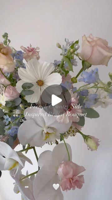 Windflower • Wedding Florist on Instagram: "DAY 6 - Pastel Pink & Dusty Blue // we brought this Pinterest board bouquet to life!  This French country side bouquet showcases some beautiful cosmos, blue delphinium, tweedia, orchids, pastel garden roses and quicksand roses 🤍✨  • • • #flowers #weddingflowers #weddingflorals #weddinginspiration #weddingflorist #bridal #bridalbouquet #bridal #2024wedding #2024bride #2025bride #2025wedding" Pastel Bouquet Wedding, French Country Side, White Orchid Bouquet, Pastel Garden, Pastel Bouquet, Blue Delphinium, Orchid Bouquet, Pink Dusty, Wedding Bouquets Pink