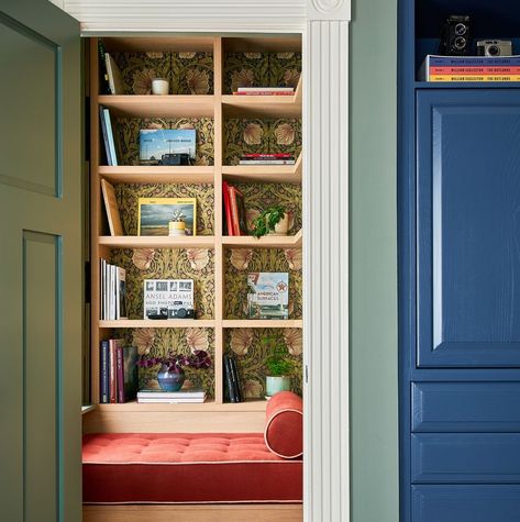 a closet with a door and books on the shelves Different Kitchen Styles, Cece Barfield, Colorado Mountain Homes, Sage Green Paint Color, Sage Green Paint, Home Office Closet, Custom Wood Doors, Office Closet, Country Kitchen Designs