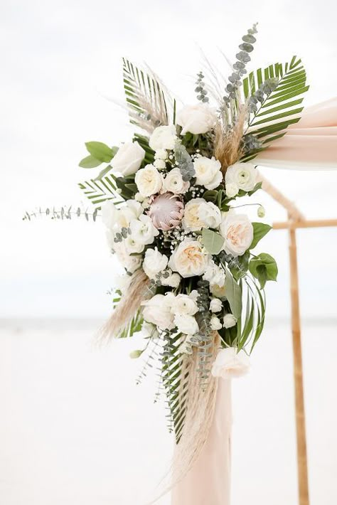 Tropical Beach Inspired Wedding Ceremony Decor, Ivory and Blush Pink Garden Roses, Silver Dollar Eucalyptus, Pink Protea Palm Leaf Floral Bouquet on Bamboo Ceremony Arch | Clearwater Beach Photographer Lifelong Photography Studios Pink Protea, Clearwater Beach Wedding, Beach Wedding Decorations Reception, Florida Destination Wedding, Beach Wedding Ceremony, Tropical Wedding Flowers, Dollar Eucalyptus, Beach Wedding Flowers, Beach Pink