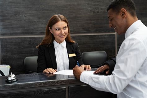 Free photo receptionist in elegant suit ... | Free Photo #Freepik #freephoto #hotel-receptionist #receptionist #female-worker #woman-worker Receptionist Photography, Front Office Hotel, Receptionist Aesthetic, Hotel Receptionist, Reception Hotel, Nativity Play, Hotel Worker, Human Pictures, Elegant Suit