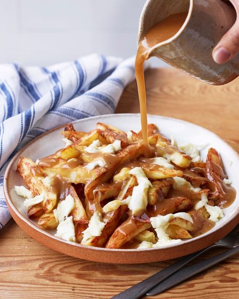 We hope you don't get a hangover, but if you do... these cheesy gravy chips, inspired by poutine, will probably sort you right out. Chips And Gravy, Big Scarves, Canadian Dishes, Cosy Season, Season Recipes, Dried Potatoes, Student Recipes, Cheese Curds, Chips Recipe