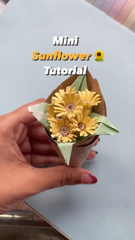 sherin - art/lifestyle on Instagram: "Detailed tutorial on mini paper sunflower! 👇🏻 Take a small rectangular paper Cut as shown in the video till mid way Do the same with…" Sunflower Paper Flowers, Sunflower Paper Craft, Paper Flower Bouquet Diy, Paper Bouquet Diy, How To Make Sunflower, Paper Flowers Diy Easy, Sunflower Crafts, Mini Sunflowers, Paper Sunflowers