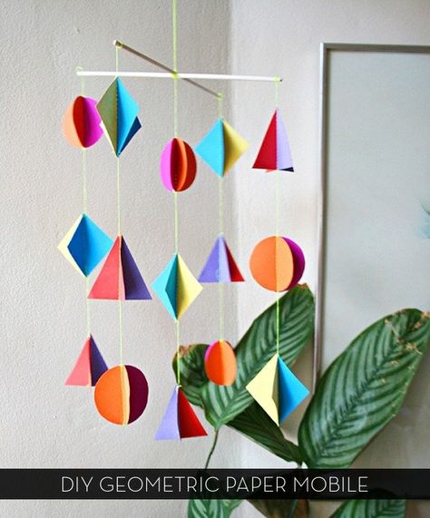 I looooooove mobiles. Love 'em. I love the energy they bring into a space, the visual interest, and the fact that they're not too terribly difficult to make yourself. And this DIY paper version? Easy peasy!     #diy Mobiles For Kids, Mobile Craft, Origami Mobile, Make A Mobile, Paper Mobile, Mobile Hanging, Diy Mobile, Mobile Art, Baby Diy