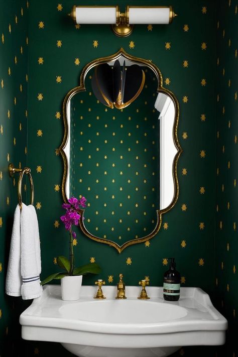 Covered with whimsical wallpaper, this jewel-toned powder room designed by @suzannkletziendesign includes our classic Merchant Double Bath Light by Thomas O'Brien. The shapely golden mirror features a perfect reflection of our Danes Small Chandelier by kate spade new york. Green Powder Room, Wallpaper Powder Room, Small Bathroom Wallpaper, Ceramic Pedestal, Paint House, Powder Room Wallpaper, Double Bath, Creative Thoughts, Decorative Wall Sconces