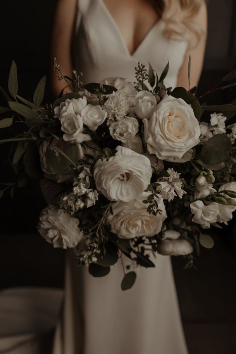 Who says crisp whites and greens can’t also be COZY? Julie and Jimmy’s elegant winter wedding at Walden took place during a freezing Polar Vortex, but the richness, warmth, and glow from their flowers brought life to their special day. Eucalyptus, pine, ferns and other seasonal greenery framed bouqu December Wedding Bouquets, Wedding Florals Greenery, January Wedding Flowers, Winter Wedding Flowers Bouquets, Garden Rose Bouquet Wedding, White And Green Bridal Bouquet, Winter Wedding Florals, Green Bridal Bouquet, Winter Bridal Bouquets