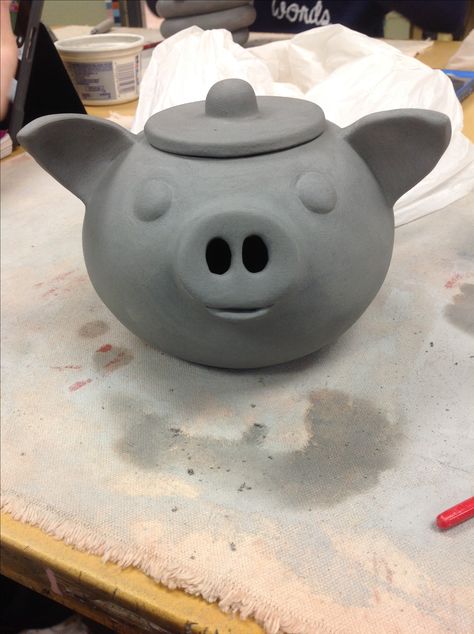 My pig teapot before firing. I'm very happy with the way it turned out. I originally planned on making a whale teapot, but it didn't work out so I had to change my idea. Pig Ceramic Sculpture, Pig Teapot, Pig Pottery, Whale Teapot, Tea Pot Pottery Ideas, Teapot Clay, Ceramic Teapots Ideas, Clay Teapots Ideas, Slab Teapot