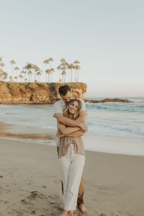 laguna_beach_couple_session 88 Engagement Photos California Beach, Jeans Beach Photoshoot Couple, Couple Beach Photo Outfits, La Jolla Beach Photoshoot, Laguna Beach Engagement Shoot, Couple Picture Poses Beach, Miami Couples Photoshoot, Couple Poses Photography Beach, Beach Engagement Photos Props