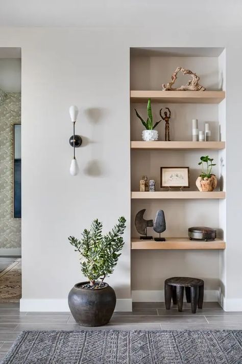 a niche with multiple wooden shelves is a great way to make use of an awkward nook you have Wall Niche Ideas, Recessed Wall Niche, Niche Shelves, Niche Decor, Niche Wall, Recessed Shelves, Wall Niche, Recessed Wall, Living Room Inspo