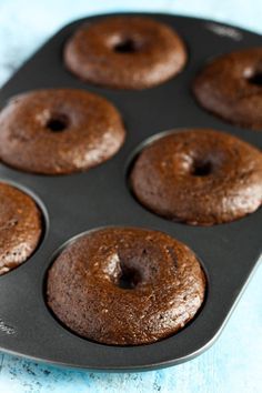 Baked Chocolate Donuts - I added mini chocolate chips & used 1/4 C sucanat, next time I won't any sugar & will use oil instead of melted butter.  I used almond milk instead of buttermilk also.  Bake at 350 This makes 6 donuts, don't know how it serves 8. Chocolate Donut Frosting, Cake Donuts Baked, Chocolate Donuts Baked, Doughnut Recipe Easy, Base Cake, Cake Donuts Recipe, Easy Donut Recipe, Donuts Donuts, Easy Donuts