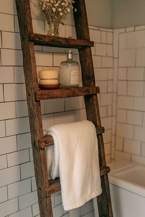 "Elevate your bathroom with the rustic elegance of a DIY Vintage Ladder Towel Rack! 🛠️🚿 Easy to make and perfect for a farmhouse or vintage-inspired look. 🌿✨ #DIYBathroomDecor #LadderUpcycle #TowelStorage" Towel Ladder Bathroom, Upcycle Ladder, Ladder Bathroom, Bathroom Tub Shower Combo, Vintage Ladder, Bathroom Tub Shower, Towel Ladder, Diy Towels, Vintage Interior Design