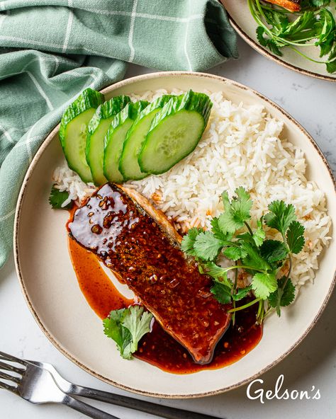 Salmon lovers, it’s your day: Our fresh Atlantic salmon fillets are on sale, and we’ve got this outrageously easy Gochujang Salmon recipe for you. We’re talking four steps! All you have to do is sear up the salmon in a hot pan and pour the rich Gochujang sauce over it — think layers of spicy sweet heat and fermented goodness. Serve it on rice with a few slices of crisp cucumber and a little cilantro, and you’ve got a simple yet scrumptious meal the whole family will be psyched to eat. Gochujang Salmon, Salmon With Rice, Salmon Cucumber, Gochujang Sauce, Salmon And Rice, Atlantic Salmon, Sweet Heat, Summer Meals, Salmon Recipe